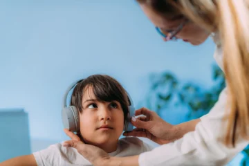 Boy having pure tone audiometry test at audiology 2026 03 10 03 54 54 utc1 scaled.webp